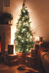 Interior of living room with beautiful Christmas tree at night
