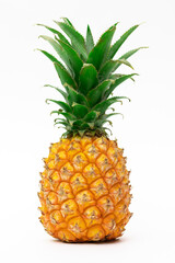 Whole ripe pineapple fruit, standing upright, on a white background.