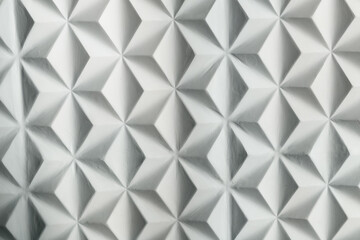 White wall with geometric pattern in triangular shape.