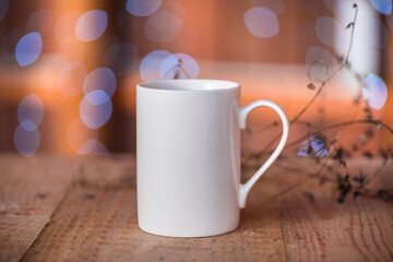 White porcelain coffee cup, mug on old wooden table