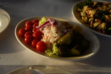 pickled red tomatoes with cucumber