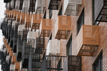 Facade with windows of an unfinished building, closeup house