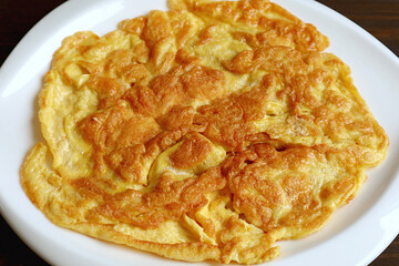 Closeup a Plate of Fresh Cooked Delicious Thai Style Omelette