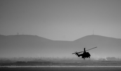 Helicopter at sea for Navy training exercises