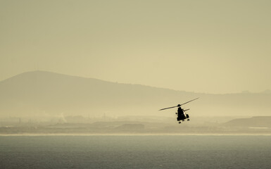 Fototapeta premium Helicopter at sea for Navy training exercises