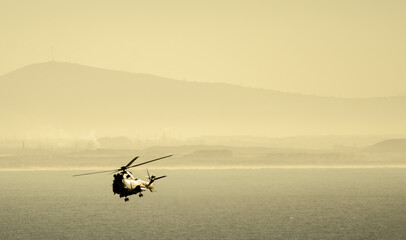 Helicopter at sea for Navy training exercises