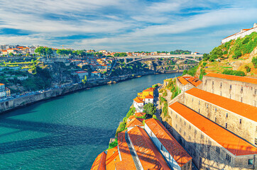 Aerial panoramic view of Porto Oporto city with Infante Dom Henrique Bridge ponte across Douro...
