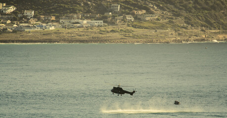 Helicopter at sea for Navy training exercises