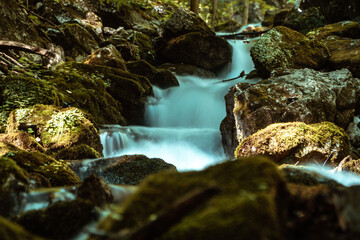 small waterfall in the forest long exposure