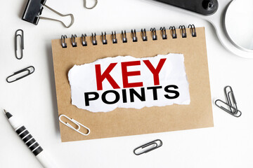 key points, text on white paper on white background