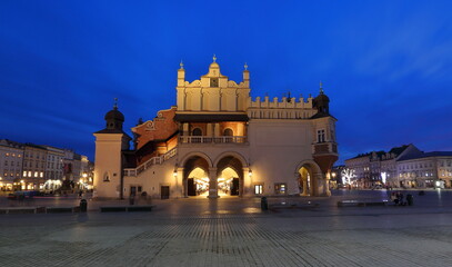 Fototapeta na wymiar Cityscape of Krakow old town, Poland, main market square with building called Sukiennice in Polish 
