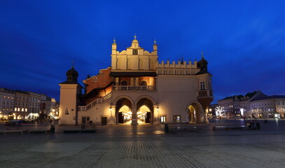 Night cityscape Krakow Poland, main market square with historical buildings