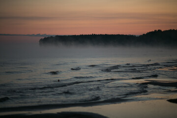 Fog on the lake and in the morning. 