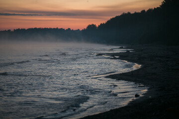 Fog on the lake and in the morning. 