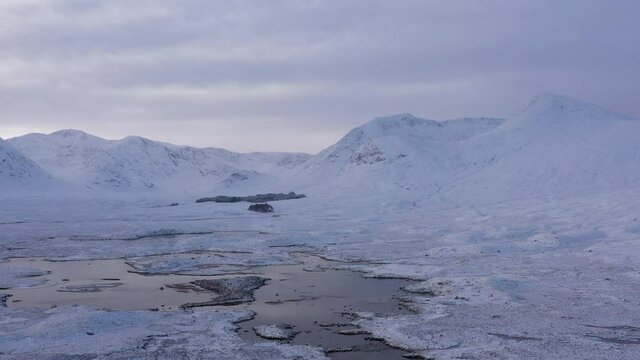 A view of Lochan na h-Achlaise on rannoch moor in the argyll region of the highlands of Scotland during a winter day near glen coe