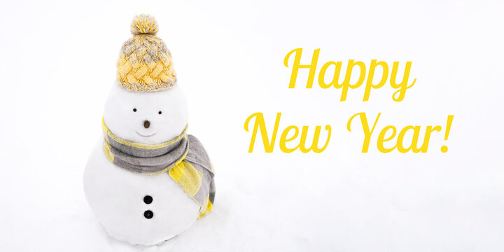 Snowmen wearing winter hat, scarf on white isolated background in trendy yellow and grey colors. 2021.