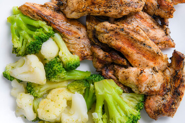 Grilled broccoli, cauliflower and chicken breast