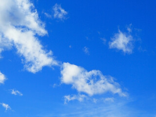 Naklejka na ściany i meble Clouds on the blue sky background and texture