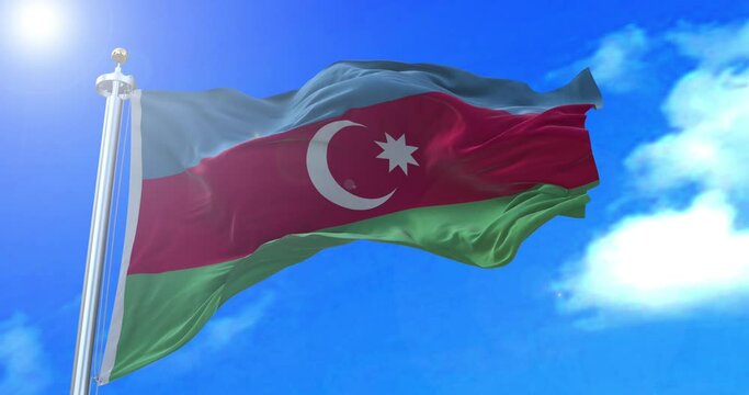 The national flag of the Republic of Azerbaijan is a horizontal tricolour featuring three equally sized fesses of bright blue, red, and green, with a white crescent and an eight-pointed star in the ce