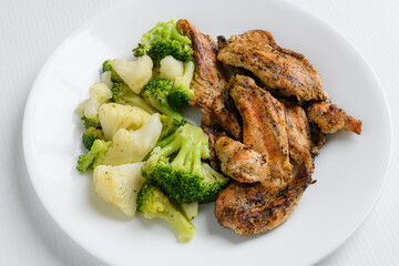 Grilled broccoli, cauliflower and chicken breast