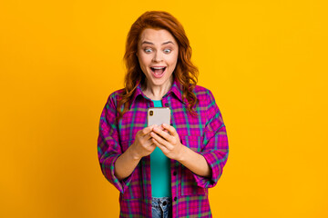 Portrait of attractive lady open mouth unbelievable news post wear checkered purple isolated on...