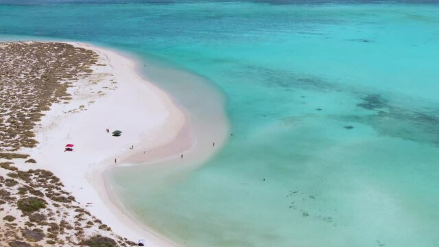 Aerial Sandy bay beach in Ningaloo reef near Exmouth in Western Australia. WA Tourism, recreation and camping concepts.