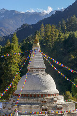 Vertical landscape view of Chendebji chorten buddhist monument near Trongsa, Bhutan - a stupa built...