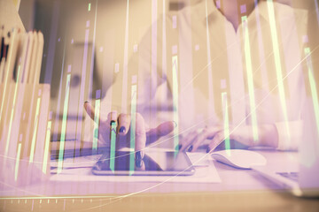 Double exposure of forex chart sketch hologram and woman holding and using a mobile device. Financial market concept.