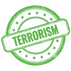 TERRORISM text on green grungy round rubber stamp.