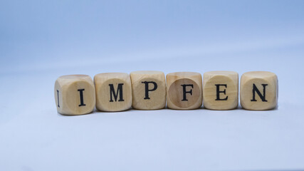 Ein Schriftzug mit  impfen