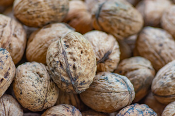 close up of walnuts on a pile
