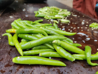 Delicious Green chili peppers on the table