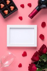 Fototapeta na wymiar Valentine's Day memory with picture frame concept on pink background