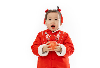 The little girl in traditional Chinese dress has an apple in her hand