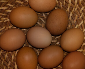 field eggs on wicker basket