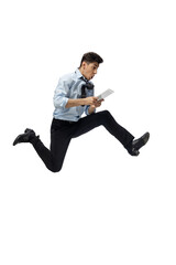 Business. Happy young man dancing in casual clothes or suit, remaking legendary moves and dances of celebrity from culture history. Isolated on white. Action, motion, fame concept. Creative occupation