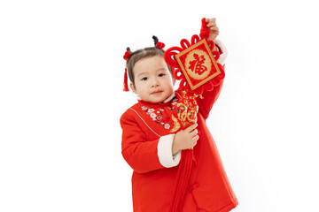 Traditional dress of Chinese baby girl with traditional Pendant in her hand