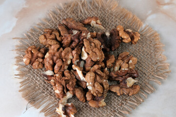 Peeled walnuts lie on the table