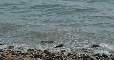 Sea wave over the rock