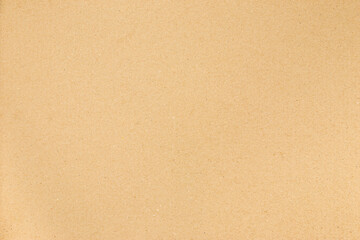 Fototapeta na wymiar Paper texture cardboard background. Closeup on a rough paper or cardboard sheet.