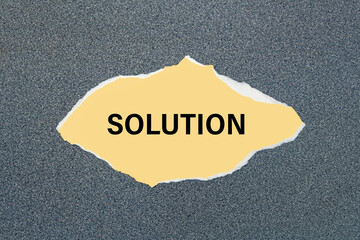 SOLUTION - written on torn yellow paper.