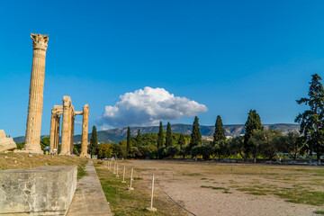 A view of a row of columns at the Temple of Olympian Zeus in central Athens, Greece in beautiful sunlight