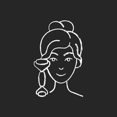 Quartz facial roller chalk white icon on black background. Reducing inflammation. Promoting wound healing. Preventing puffiness, wrinkles under eyes. Isolated vector chalkboard illustration