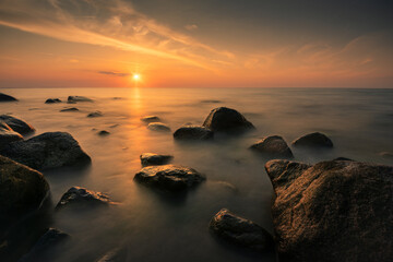 Piastowskie Stones on the Baltic Sea over the sunset