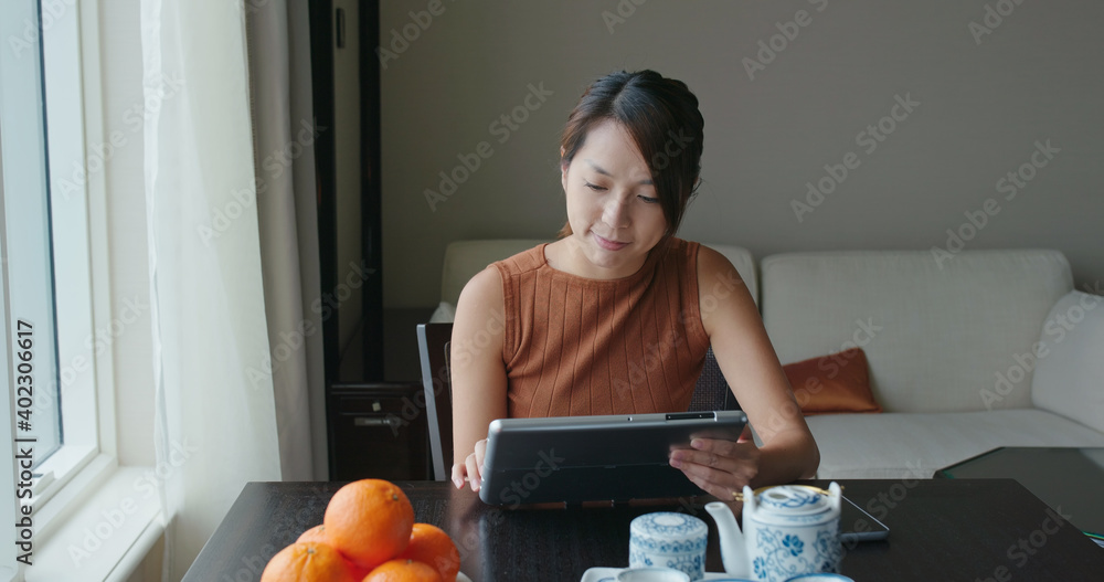 Poster woman use tablet at room