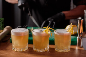 Cocktail glass with exotic drink in the pub bar. drinks concept