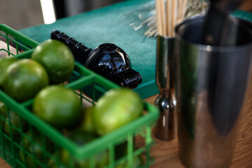 bartender squeezing lemons with a juicer. profession concept
