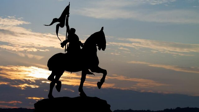 Joan of Arc or Jeanne d'Arc at Sunrise, Time Lapse with Silhouette of Bronze Equestrian Statue, Paris, France