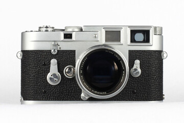 A vintage German Leica M3 rangefinder camera from 1950's. - obrazy, fototapety, plakaty