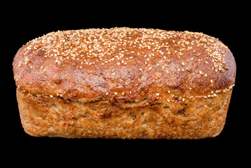 Freshly baked homemade bread isolated on black. Rye bread with red berries and sesame. Healthy eating and traditional bakery, baking bread concept